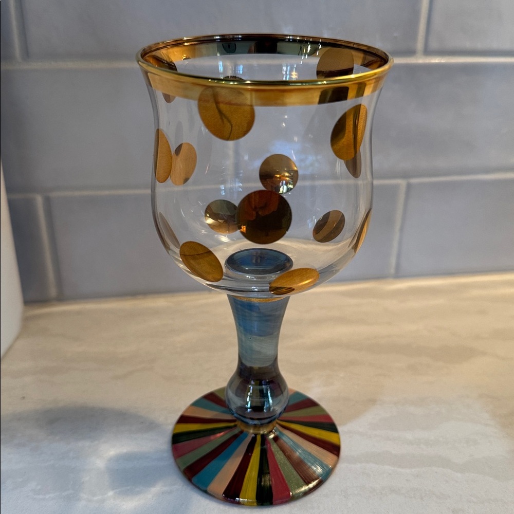 MacKenzie-Childs multi colored and gold wine glass